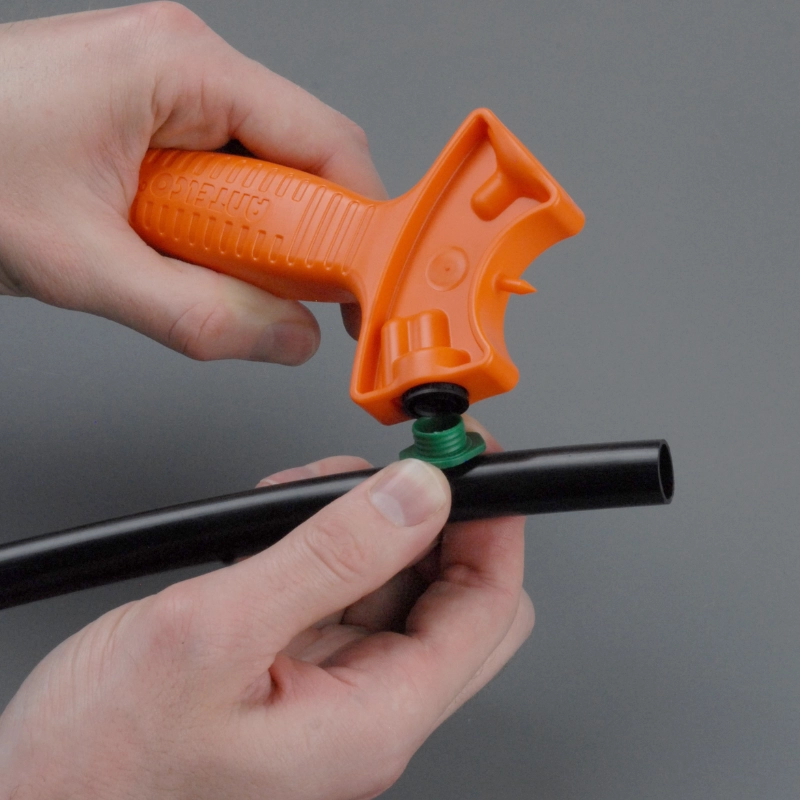 DripMate® Tool grips CETA® caps to disassemble